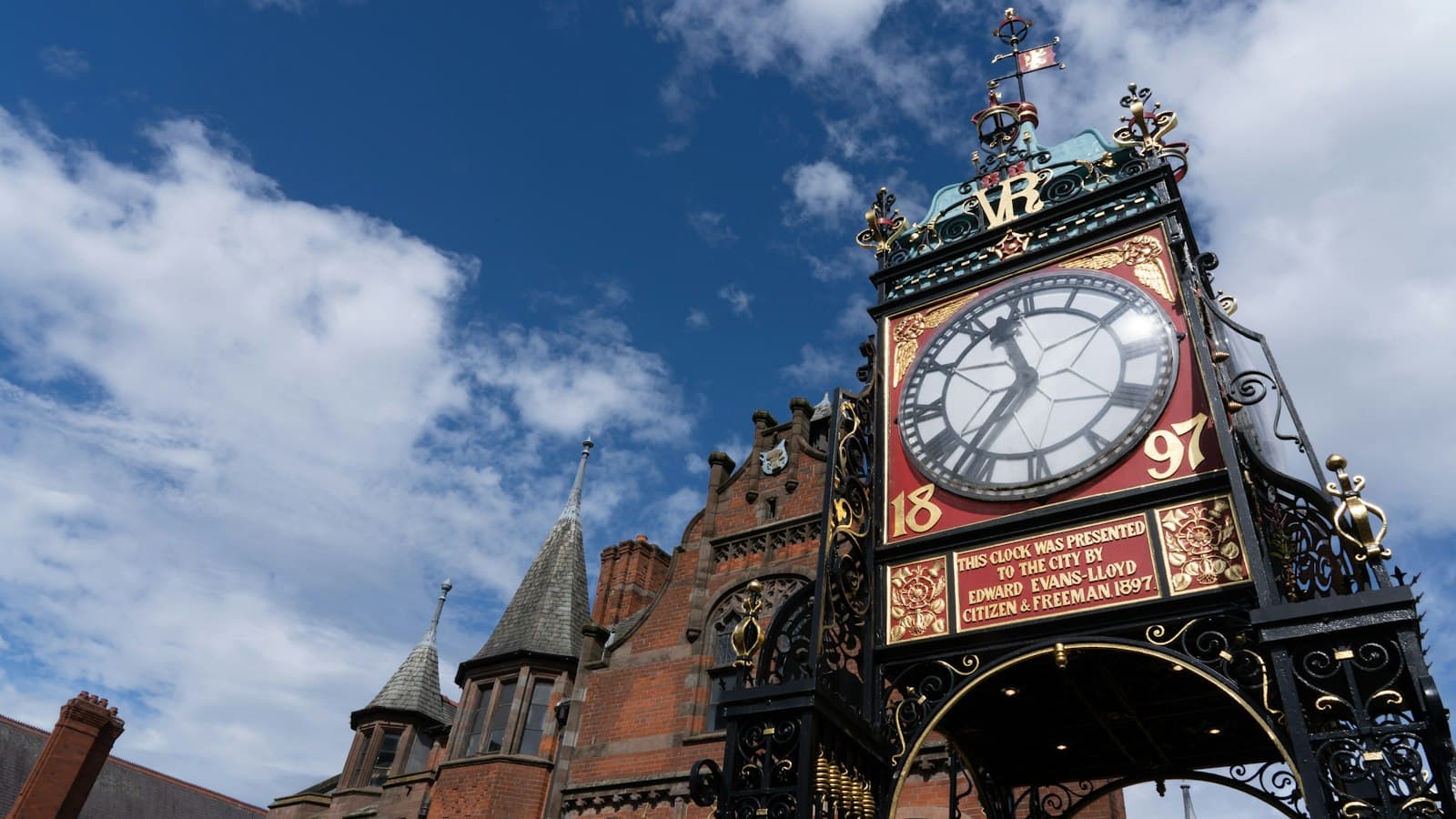 The Eastgate Clock in Chester against a blue sky